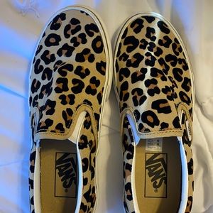 Women’s size 5.5 cheetah print vans.